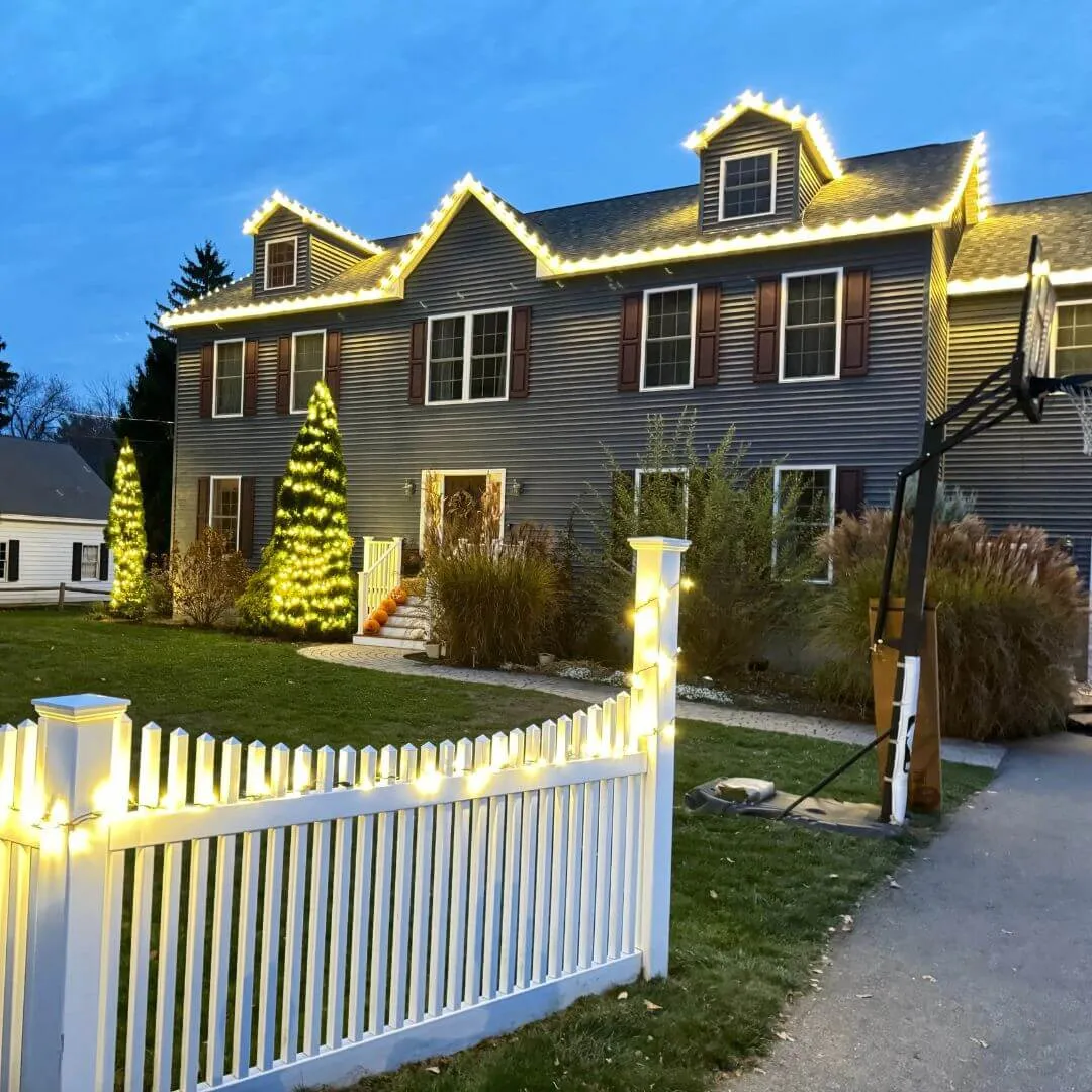 Completed MN Lighting Squad exterior lighting project on a Twin Cities home at night
